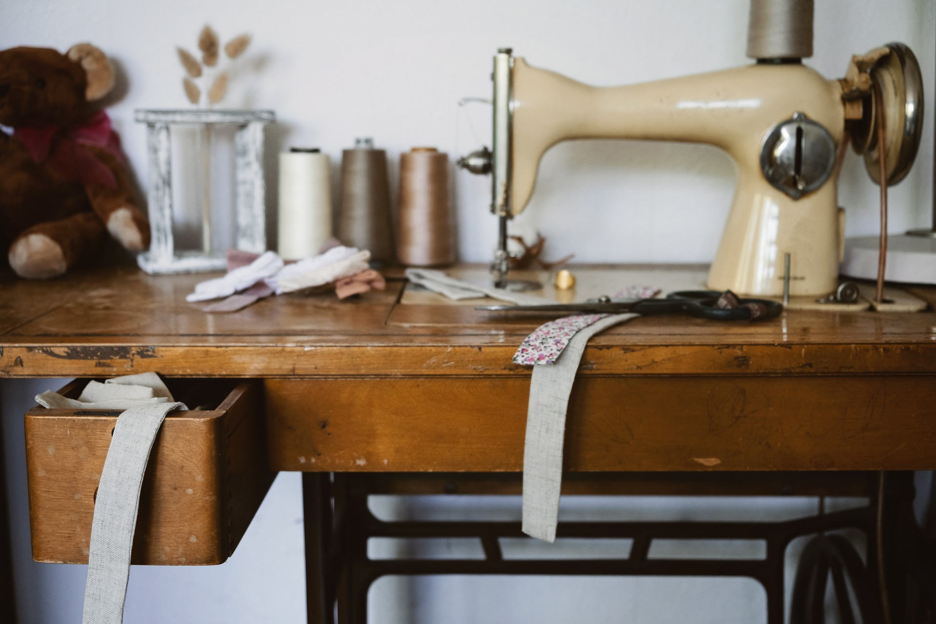 Small Business Ideas, Seamstress  Workspace. Old Vintage Hand Sewing Machine, Ribbons